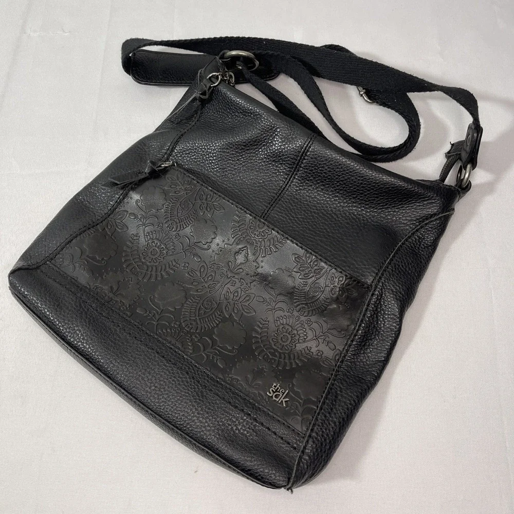 The Sak Crossbody Black Genuine Leather Tooled Embossed Purse Tassels